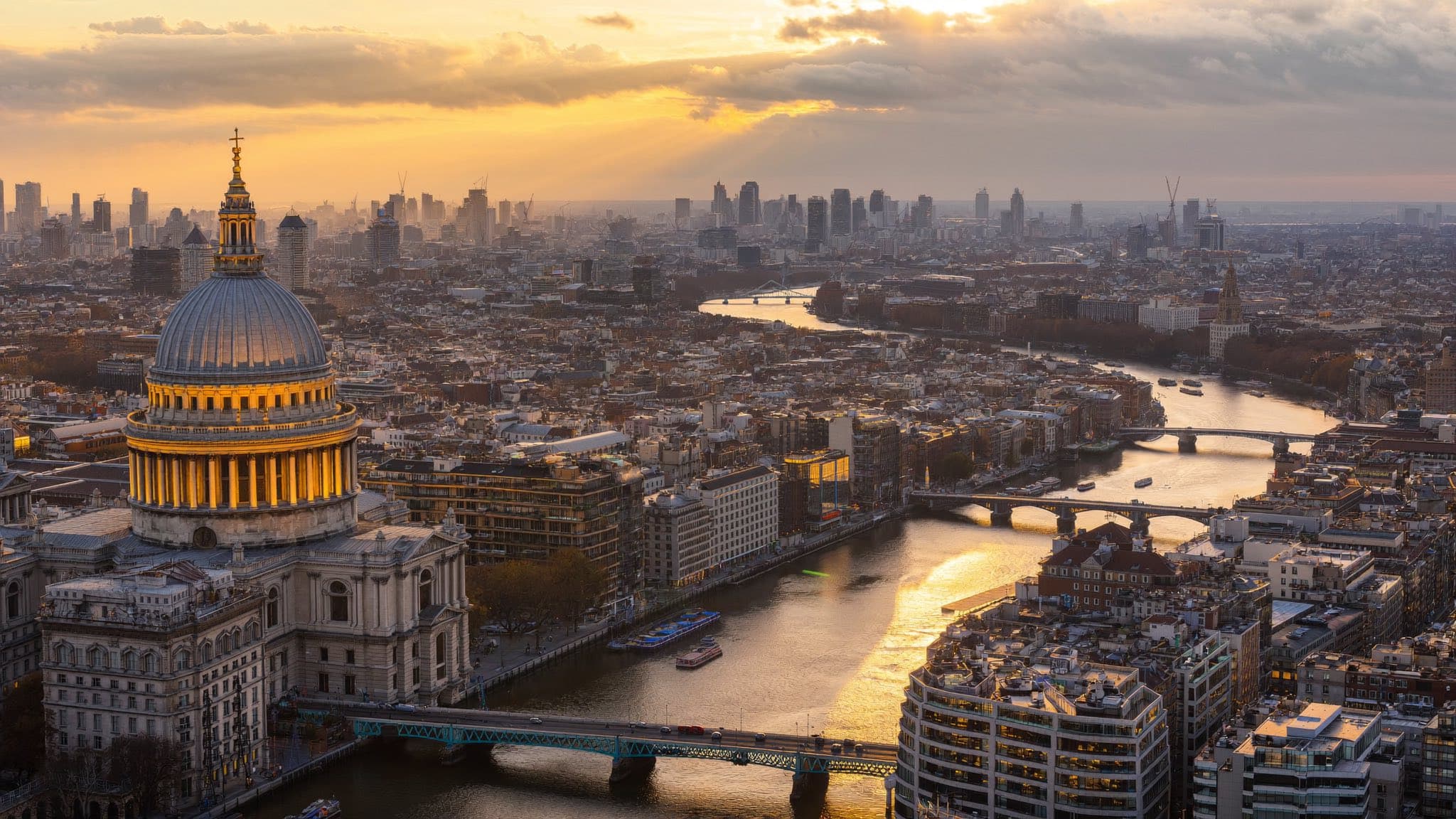 Golden-hour panorama over the River Thames and St Paul's Cathedral